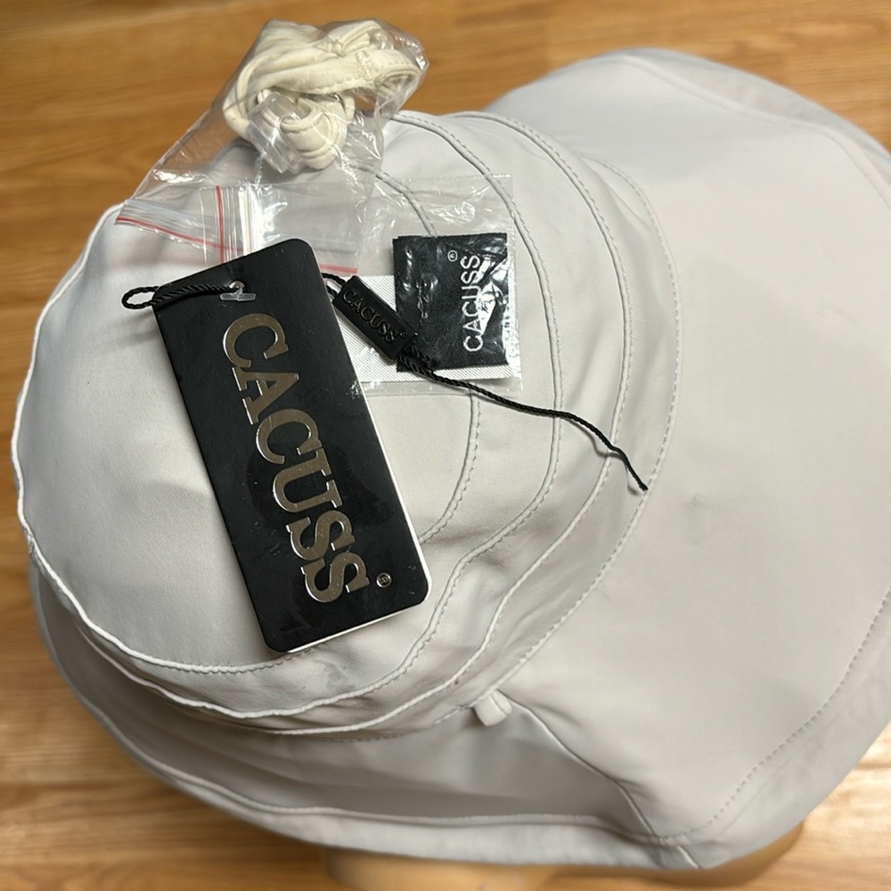 NEW Cacuss authentic Garment registered.Wheat colors  Hat with ties